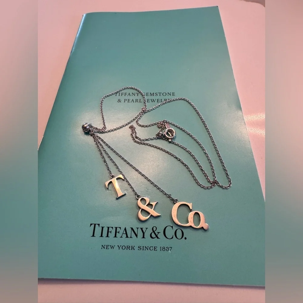 Tiffany & Co. Rare 925 Silver T&Co Dangle Letters Logo Pendant 16